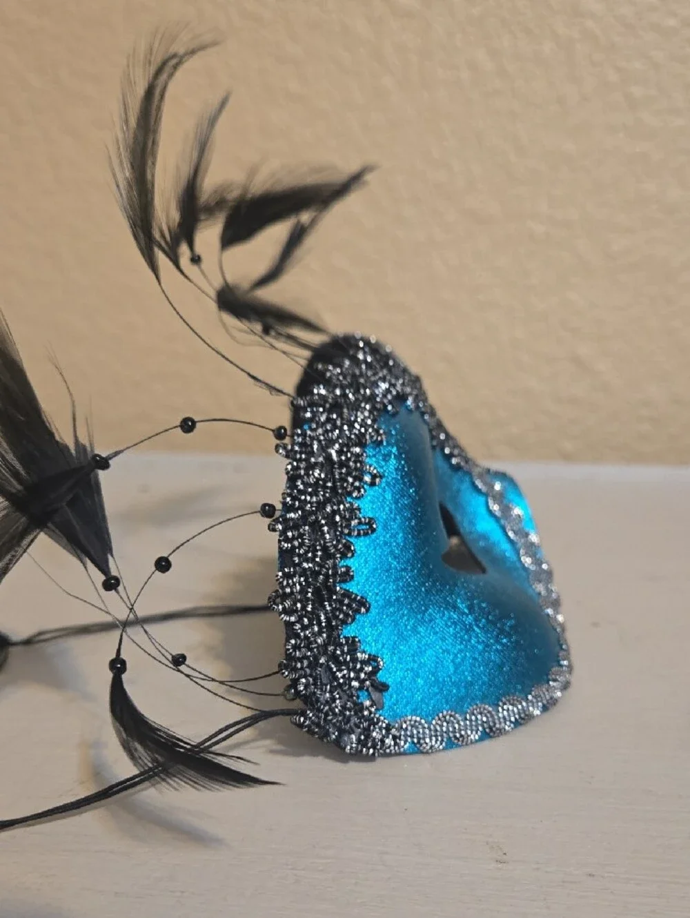 Turquoise Feathered Masquerade Mask with Silver Trim